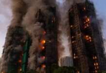 Hong Kong takes measures to suppress public outrage after massive fire