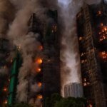 Hong Kong fire: 83 dead, dozens missing, construction company executives arrested