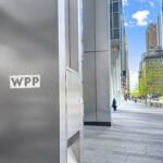 A former WPP exec is suing the ad agency giant, claiming he was fired after flagging an alleged kickback operation