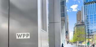 A former WPP exec is suing the ad agency giant, claiming he was fired after flagging an alleged kickback operation