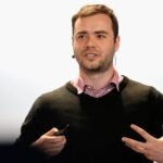 The computer scientist who coined ‘vibe coding’ says self-driving cars will ‘terraform’ outdoor spaces