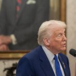 Trump plans to expand US travel ban to 30 countries after Washington shooting