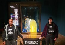 Activists threw food at the display case with the Crown Jewels in the Tower of London