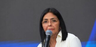 Venezuela's interim leader changes rhetoric after Trump's warnings
