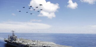 Trump expands military options to strike Iran amid carrier group arrival