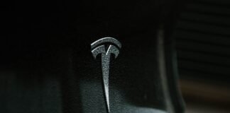 Tesla customer seeks retrial following spending restrictions