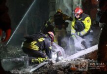 Rescuers pulled the body of the second victim from under the rubble of a high-rise building in Kharkiv