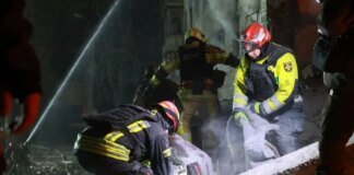 Rescuers pulled the body of the second victim from under the rubble of a high-rise building in Kharkiv